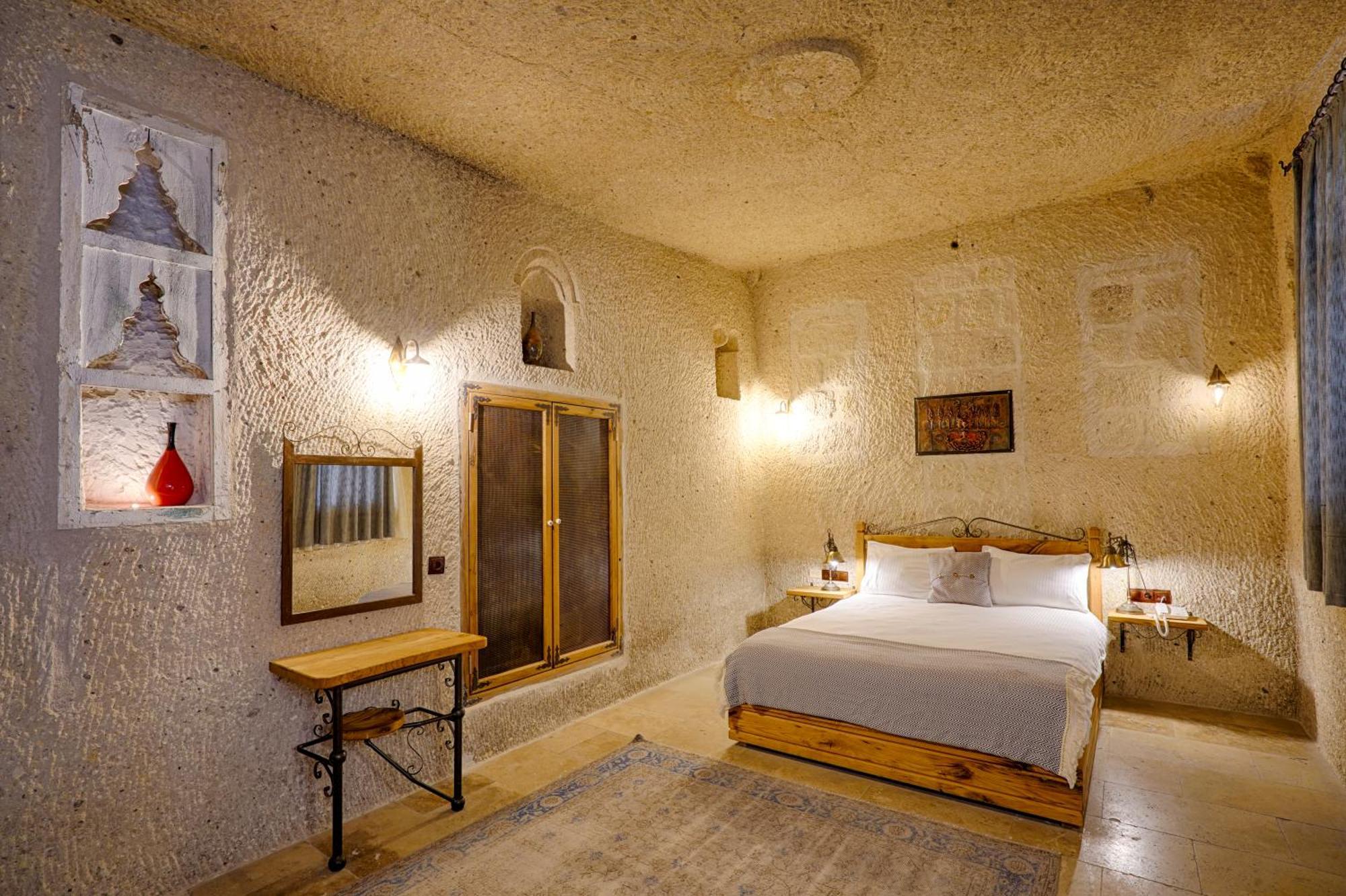 Design Cave Hotel Гьореме Стая снимка